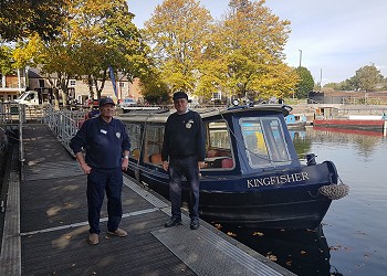 Chichester Ship Canal Trust volunteers standing next to one of their Canal Boats Chichester Ship Canal Trust volunteers standing next to one of their Canal Boats