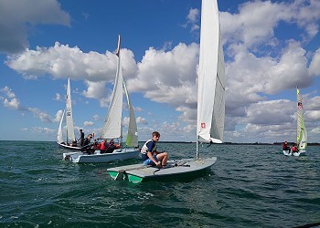 Images of sailing boats showcasing Arun Youth Aqua Centre volunteers and young people Images of sailing boats showcasing Arun Youth Aqua Centre volunteers and young people
